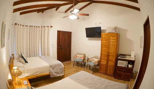 Chambre Double Deluxe, 2 grands lits, coin cuisine, en bord de piscine