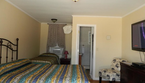 Chambre, plusieurs lits