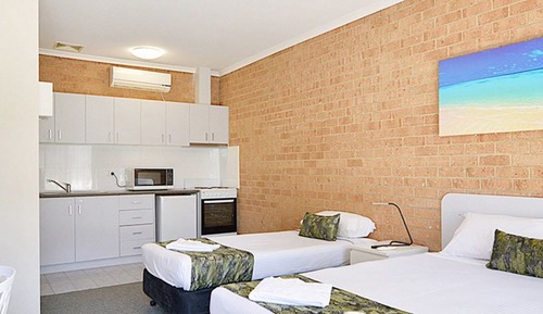 Chambre Quadruple Deluxe, plusieurs lits