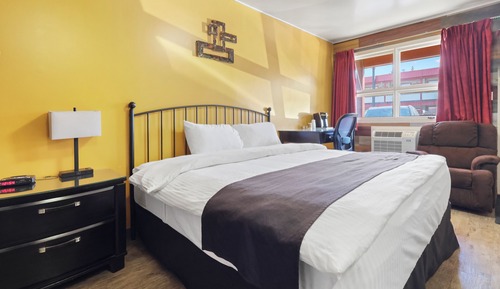 Chambre Affaires, 1 très grand lit, accessible aux personnes à mobilité réduite