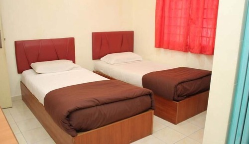 Chambre avec lits jumeaux