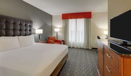 Chambre Deluxe, 1 très grand lit, réfrigérateur et four à micro-ondes