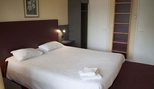 Chambre Triple Tradition, plusieurs lits, non-fumeurs, vue jardin