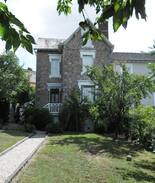 Saint-Junien Maison | Charmante maison de 1930 avec jardin arboré.