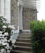 Saint-Junien Maison | Charmante maison de 1930 avec jardin arboré.