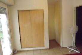Merignac Maison | Vaste chambre double avec accès au jardin.