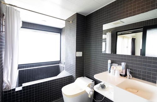 Imadomari Maison | 202 Sunset Guest room with openair bath Relax / Kunigami-gun Okinawa