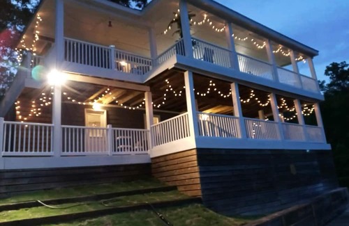 Titus Maison | What a view of our beautiful Lake Jordan. This cabin is sure to charm you .