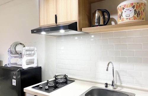 South Tambun Appartement | Simple Studio At Lrt City Bekasi Apartment By Travelio