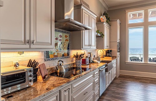 Fort Morgan Maison | Postcard views from your home equipped with a dream kitchen! Come enjoy luxurious living in a highly sought-after neighborhood in Fort Morgan.