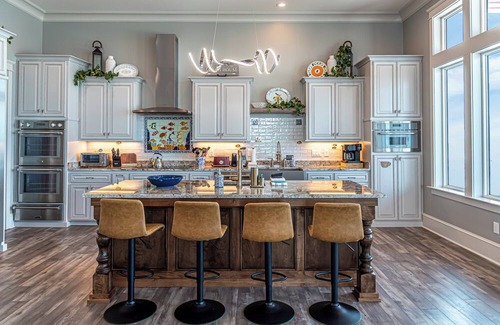 Fort Morgan Maison | Postcard views from your home equipped with a dream kitchen! Come enjoy luxurious living in a highly sought-after neighborhood in Fort Morgan.