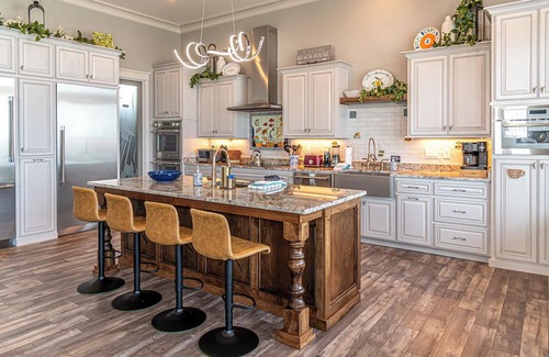 Fort Morgan Maison | Postcard views from your home equipped with a dream kitchen! Come enjoy luxurious living in a highly sought-after neighborhood in Fort Morgan.