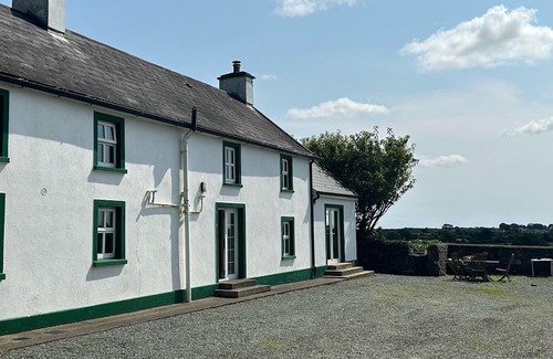 Hook Head Maison | Gorgeous renovated farmhouse with sweeping views of lush farmland!
