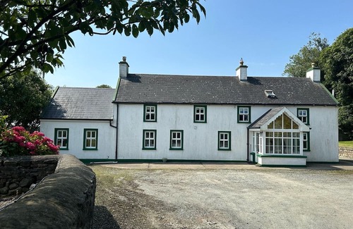 Hook Head Maison | Gorgeous renovated farmhouse with sweeping views of lush farmland!