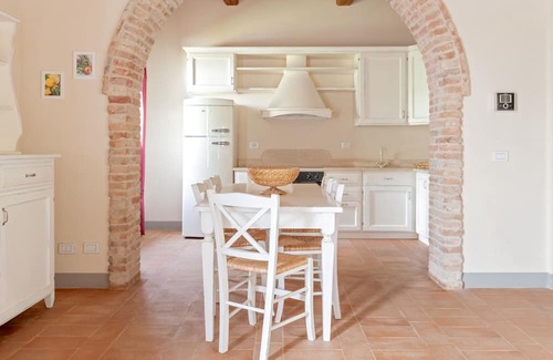 Toiano Maison | Holiday Home 'Casa Rossa - Campagna Toscana' with Shared Pool, Private Garden and Wi-Fi