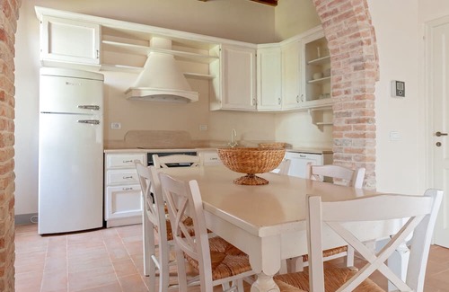 Toiano Maison | Holiday Home 'Casa Rossa - Campagna Toscana' with Shared Pool, Private Garden and Wi-Fi