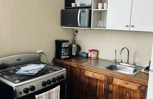Villa Nueva Appartement | Charming 3-bedroom apartment with AC and WiFi in enchanting Amatitlán