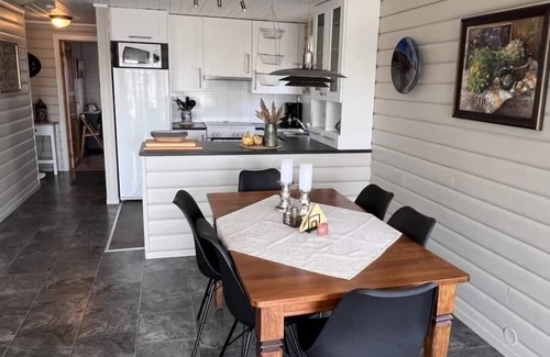 Lindesnes Maison | Holiday home Mona in Lussevika, new addition 2024, near Spangereid-Lindesnes, southern Norway, , max. 6 adults, own boat mooring, approx. 100 m² living space, 3 bedrooms, charming and tasteful furnishings, large veranda with fjord view, terrace f.
