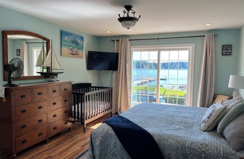 Shelton Maison | Lakefront property, beautiful view with steps into water, large private dock.