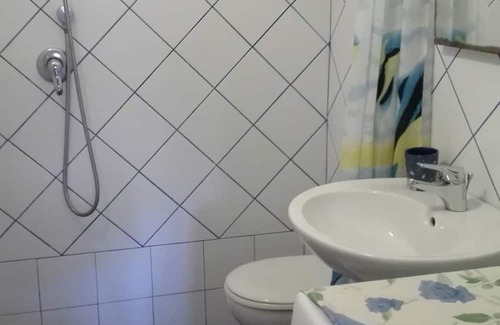 Giannella Maison | Holiday Home 'Residence Giannella - Gardenia 12' with Private Garden