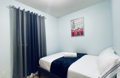 Slave Lake Maison | Modern Upper Level Duplex House Beside Convenience Store and Gasoline Station