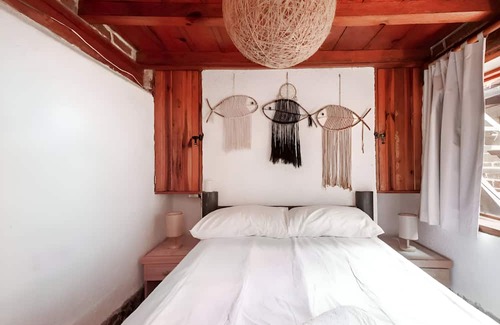 El Santuario Cabine | Hippie Ranch Cabaña en borde de lago