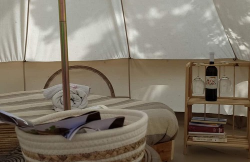Arpino Maison | 12 m2 tent equipped with a comfortable French double bed, with an internal space to relax in. The ex
