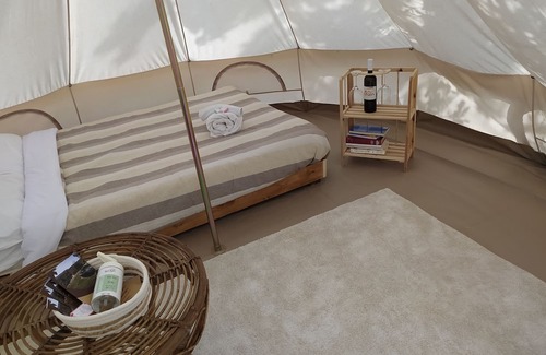 Arpino Maison | 12 m2 tent equipped with a comfortable French double bed, with an internal space to relax in. The ex