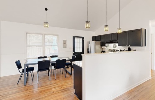 Salisbury Maison | Perfectly located home with deck, open layout, smart TVs, central AC, & W/D
