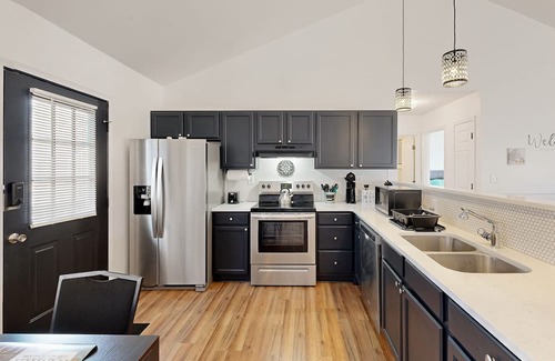 Salisbury Maison | Perfectly located home with deck, open layout, smart TVs, central AC, & W/D