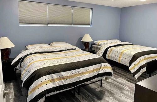 Regina Maison | 4 Bedroom Spacious House In Regina! Close to downtown & Mosaic Stadium.