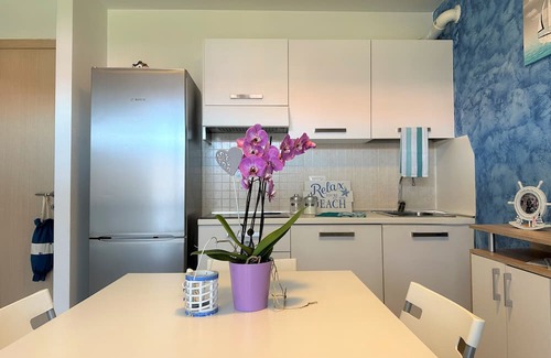 Aprilia Marittima Appartement | Flat in a colourful residence with pool