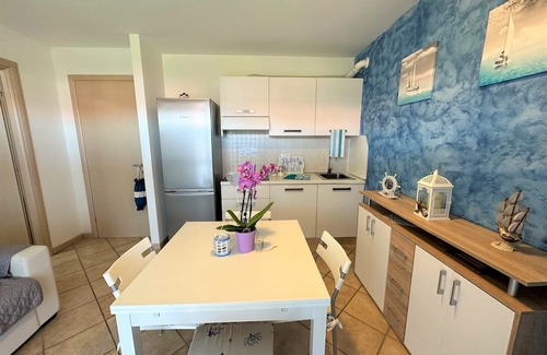 Aprilia Marittima Appartement | Flat in a colourful residence with pool