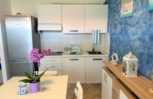 Aprilia Marittima Appartement | Flat in a colourful residence with pool