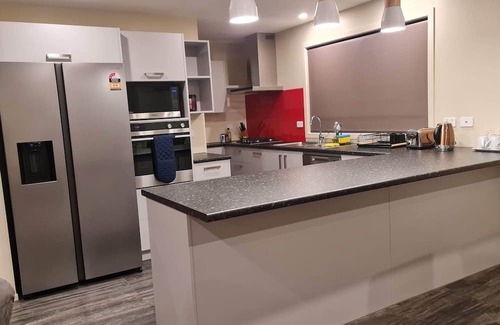 Palmerston North Maison | El Beracca Retreat - A Home away from home.
