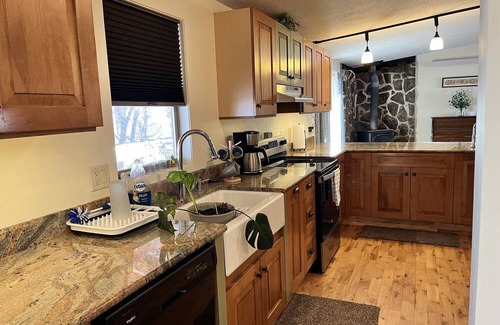 Freedom Maison | Newly remodeled home with a Barnwood rustic siding and an updated clean interior