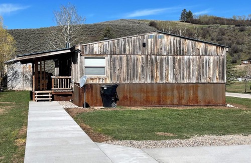 Freedom Maison | Newly remodeled home with a Barnwood rustic siding and an updated clean interior