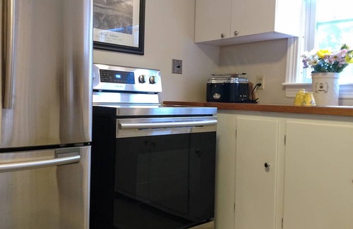 Pawtuxet Village Historic District Maison | A Curated Cape on the Cove....walk to shops and restaurants in seaside village.