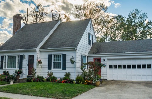 Pawtuxet Village Historic District Maison | A Curated Cape on the Cove....walk to shops and restaurants in seaside village.