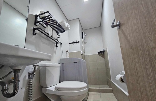 Marilao Copropriété | 5 minutes to SM Marilao! Family-size condo with Smart Tv for Netflix.