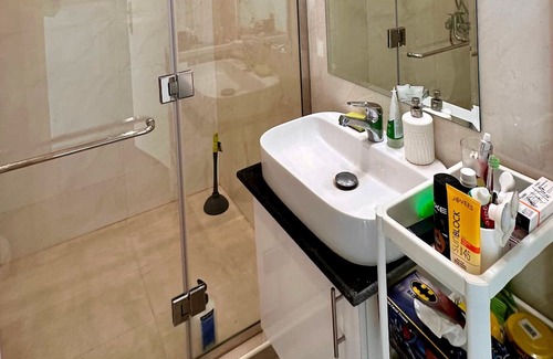 Doha Appartement | Heart of Doha Elegant Home with Shared Swimming Pool
