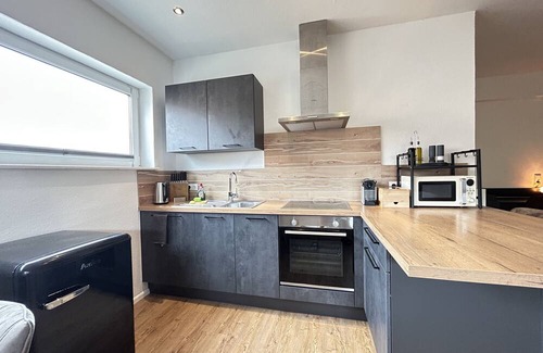Mahlberg Appartement | Lumiflats: Deluxe Studioapartment mit Terrasse und Garten Nähe Europapark