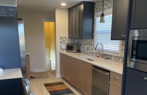 Everett Maison | Beautiful three bedroom, two bath newly renovated brick home with 2 car garage.