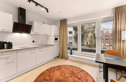 Burgeresch Appartement | Between-studios - Tiger