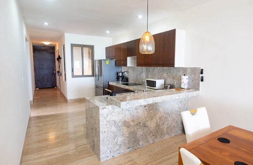 Yucatan Peninsula Copropriété | Brand New Beachfront Deluxe 3 BR Condo