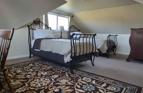 Adin Maison | Cozy up at Serenity with its picturesque views, where the West still lives.