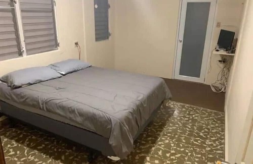 Mayaguez Pueblo Maison | Nice House near University of Mayaguez with covered and gated car parking.