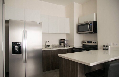 Guacima Copropriété | Great apartment near the Airport with Air Condit.