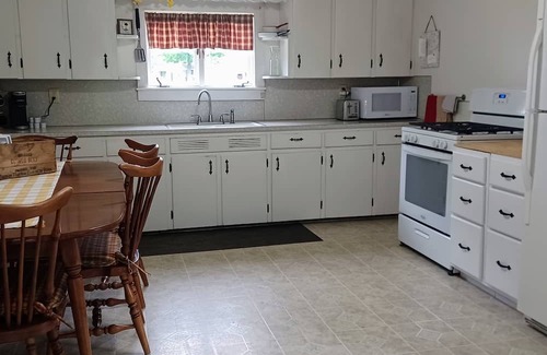 Laurelton Maison | White house walking distance to Penn's Creek and Bald Eagle State Forest.