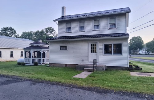 Laurelton Maison | White house walking distance to Penn's Creek and Bald Eagle State Forest.